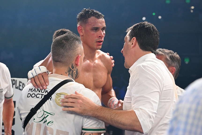 David Nyika is helped to his feet