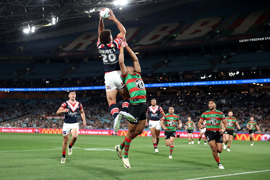 Mark Nawaqanitawase leaps to catch the ball