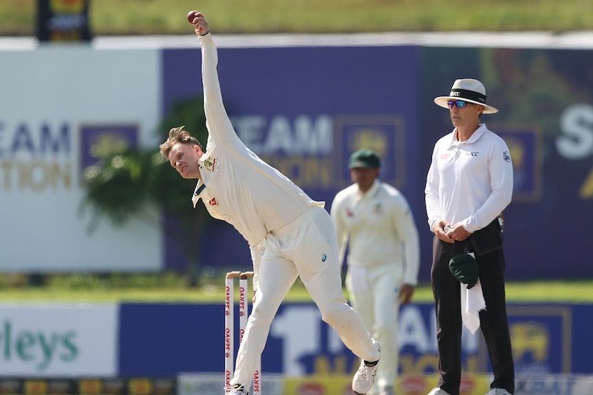 Australia's Matthew Kuhnemann about to release the ball while bowling in a Test in Sri Lanka