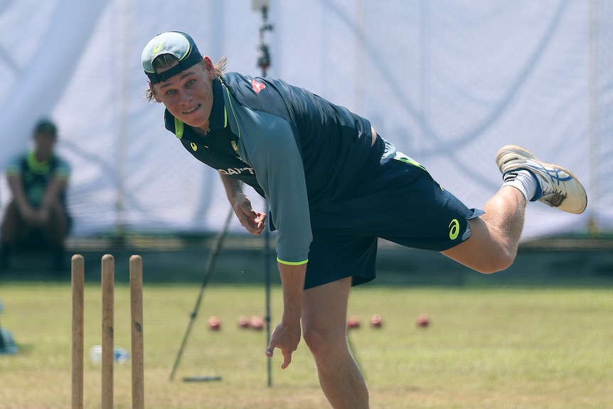 Cooper Connolly bowls in the nets