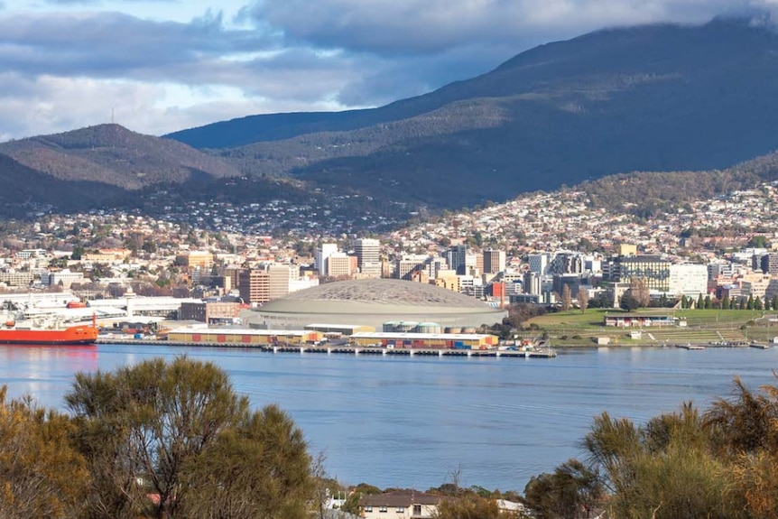 Outline of stadium in Hobart seen from across the Derwent.