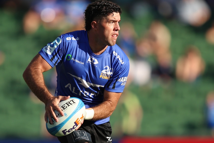 Ben Donaldson passes the ball to his left during a Western Force match.