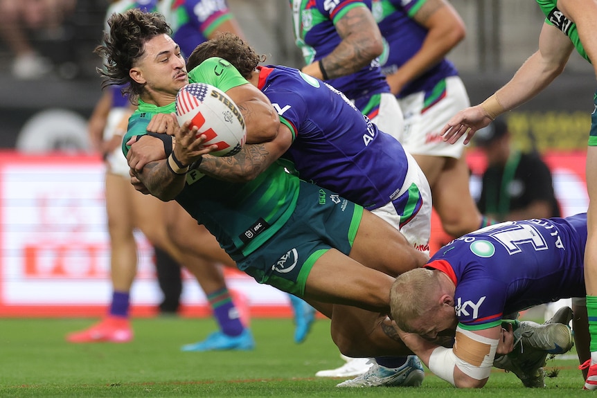 Xavier Savage is tackled