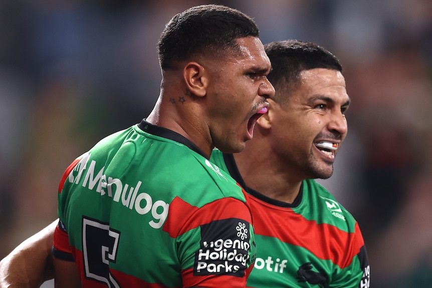 Tyrone Munro of the Rabbitohs celebrates with Cody Walker