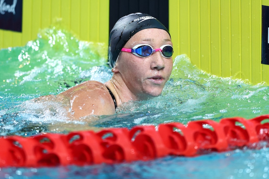 Lani Pallister touches the wall