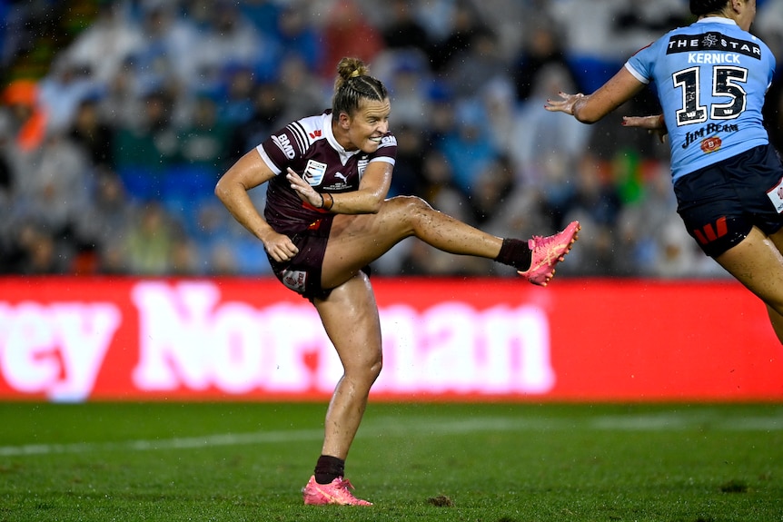 Lauren Brown kicks a goal