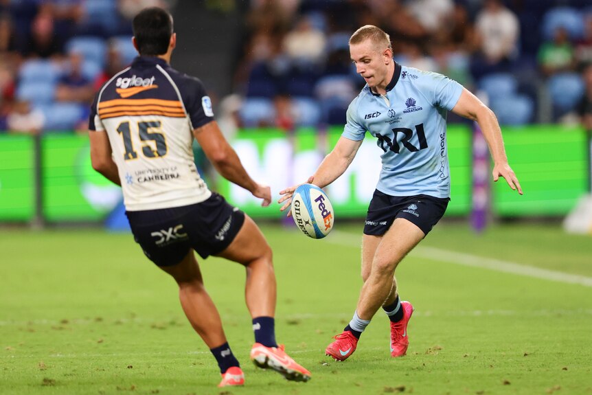 Max Jorgensen about to kick the ball against the Brumbies.