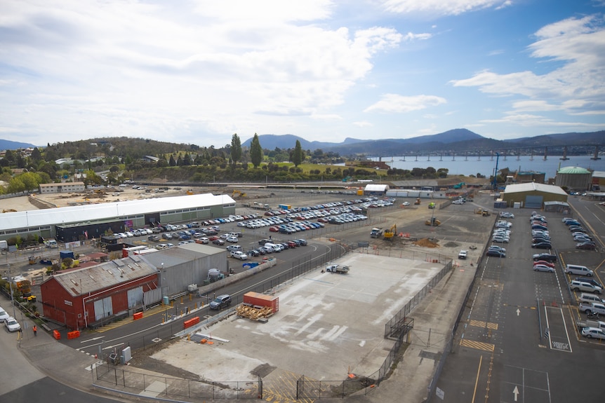 View from a tall tower over a port.