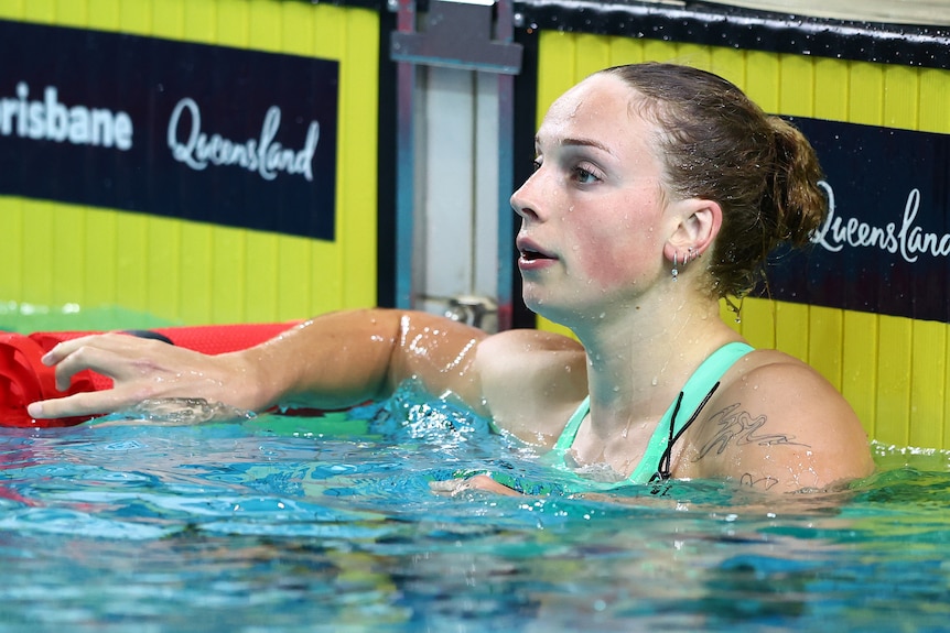 Tara Kinder looks down the pool