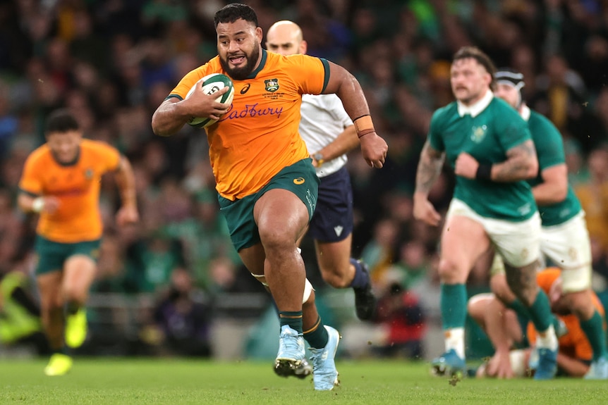 Taniela Tupou runs the ball for the Wallabies against Ireland.