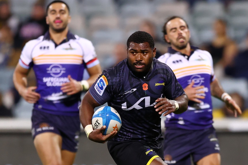 Kini Naholo scores a try for the Hurricanes
