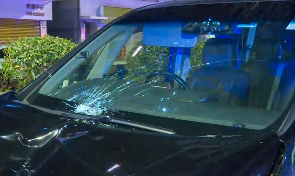 The victim was trapped under the car before he was rescued and rushed to hospital, where he died. Photo: Cable TV The victim was trapped under the car before he was rescued and rushed to hospital, where he died. Photo: Cable TV