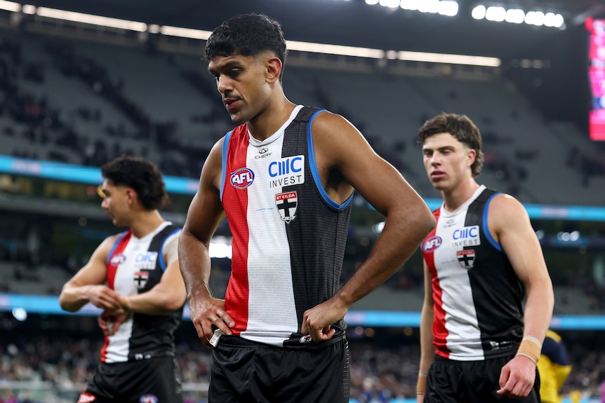 Nasiah Wanganeen-Milera walks and has his hands on his hips