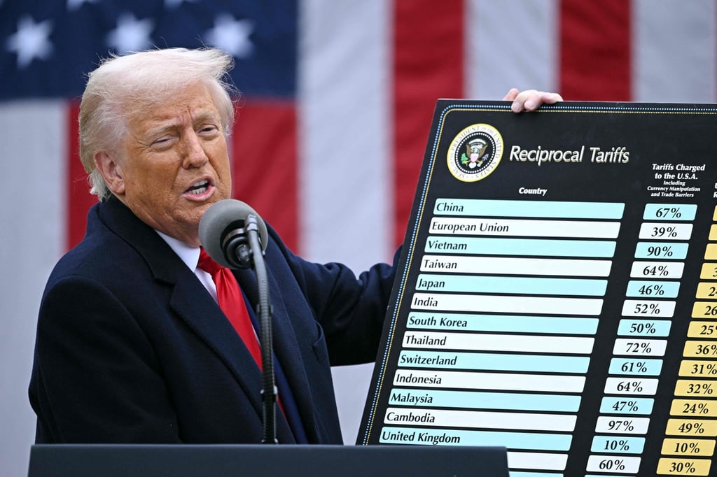 Donald Trump holds a chart outlining “reciprocal” tariffs at the White House on April 2. Photo: AFP