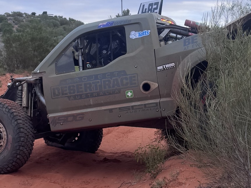 A racing truck on a desert track.