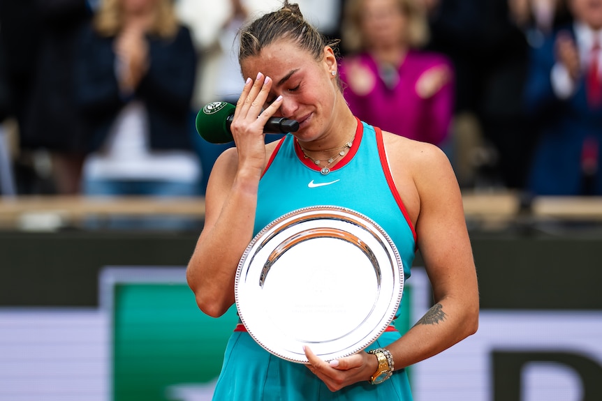Aryna Sabalenka during the trophy ceremony after losing to Coco Gauff in the French Open final.