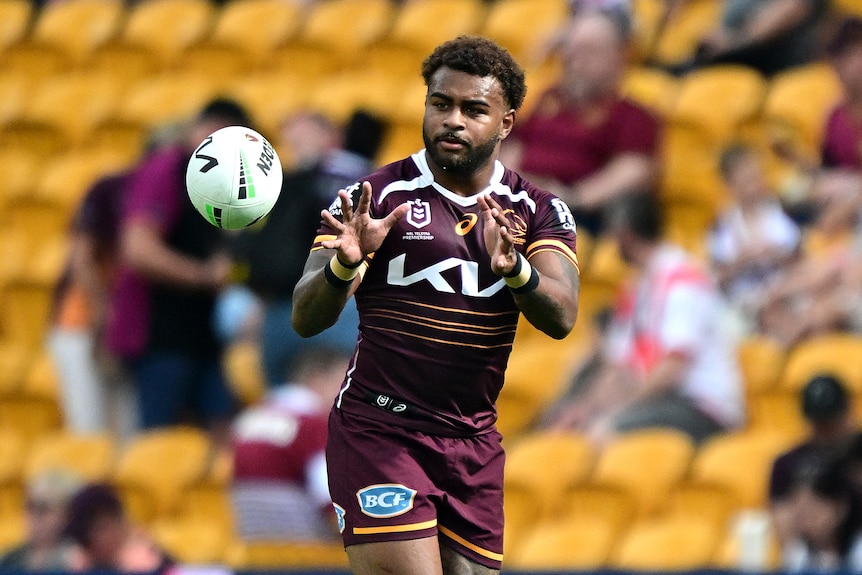 Ezra Mam of the Broncos catches the ball during the warm up