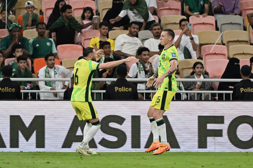Mitch Duke and Martin Boyle celebrate