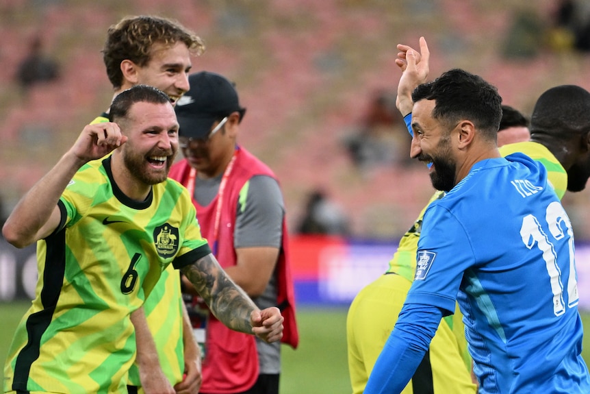 Martin Boyle and Paul Izzo celebrate