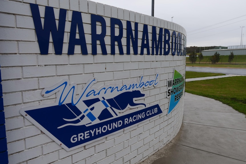 Greyhound racing sign that says Warrnambool.