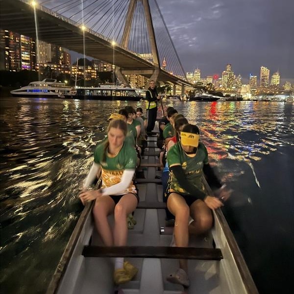A dragon boat crew on the water