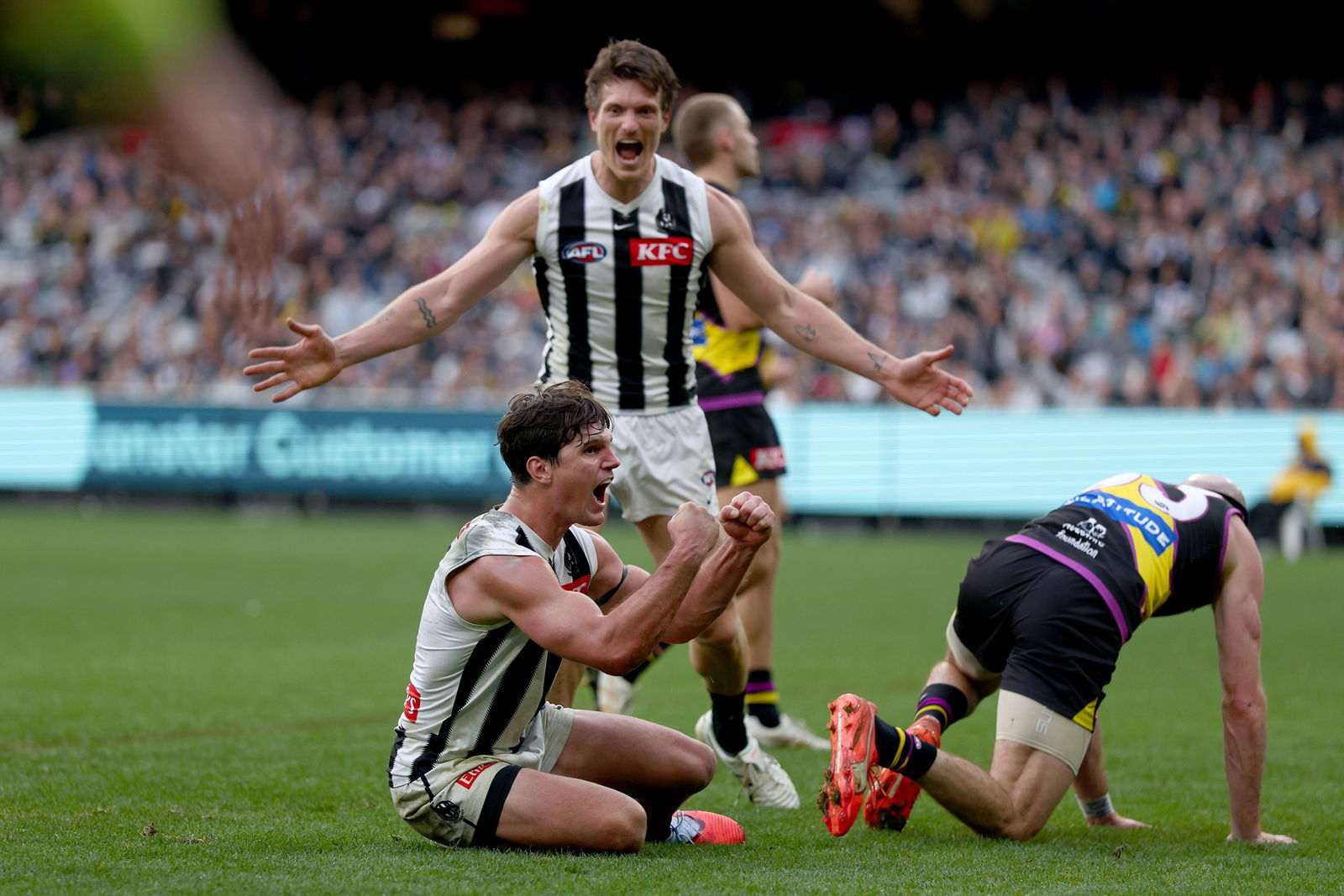 Lachie Schultz celebrates after kicking a brilliant goal in the third quarter.