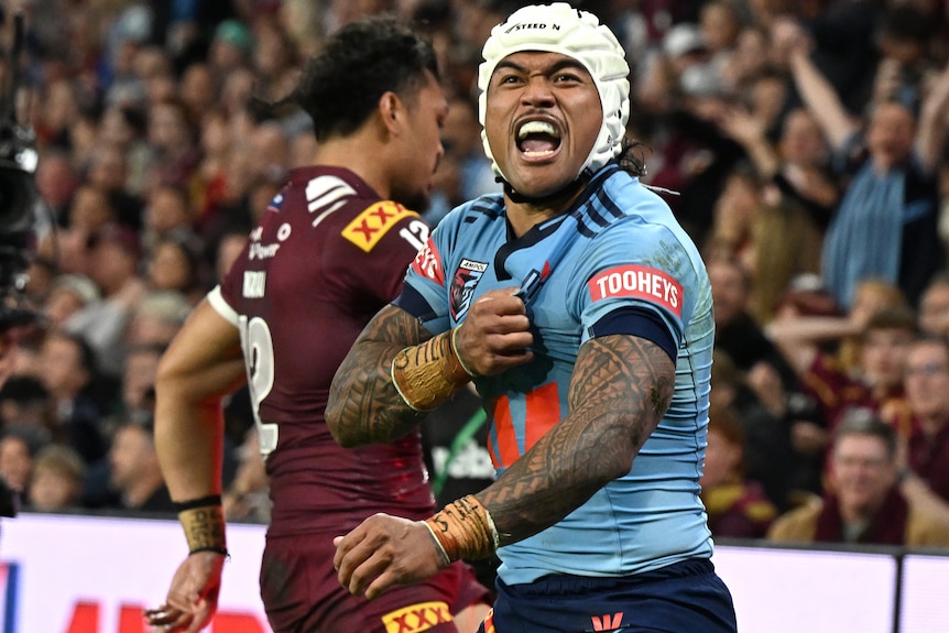 Brian To'o celebrates a try for NSW in State of Origin I.