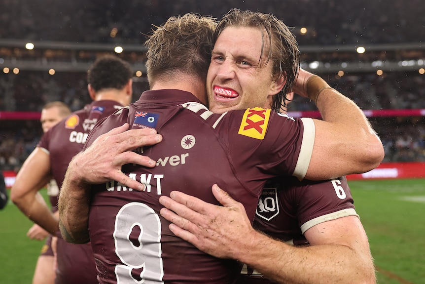 Cameron Munster hugs Harry Grant