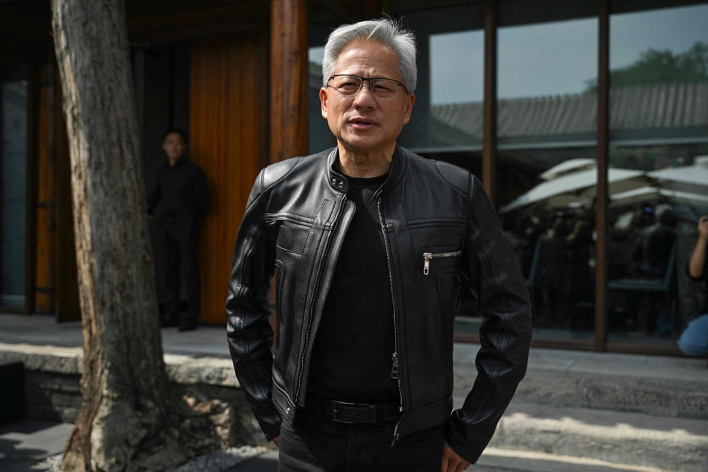 Known for his trademark black leather jacket and jeans, Huang has been dubbed “Leather Jacket Guy” by the mainland media. Photo: AFP
