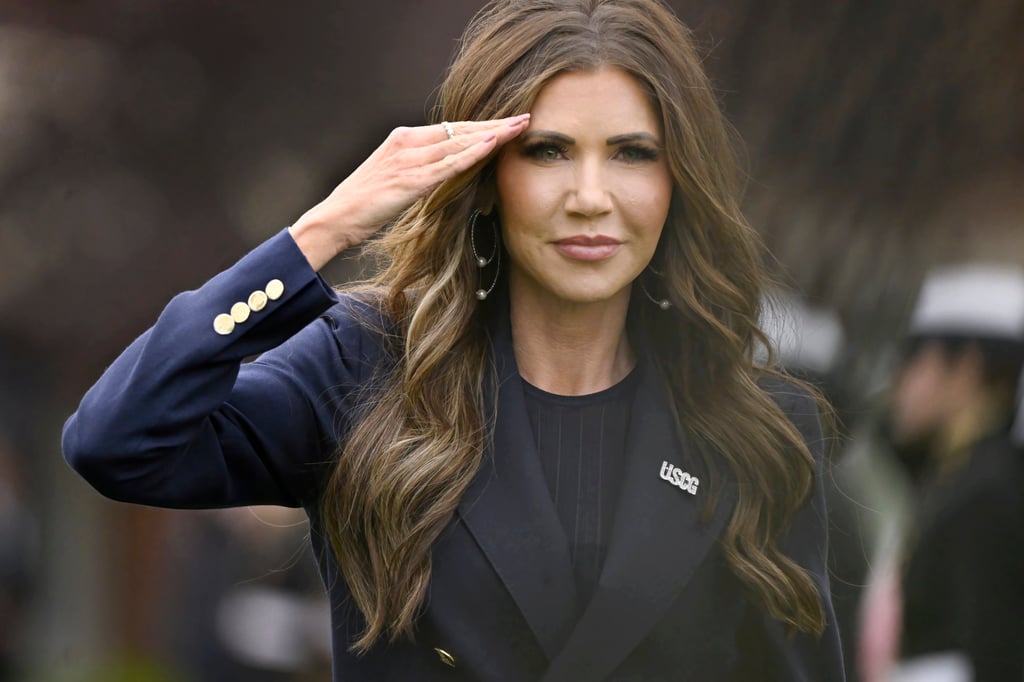 US Homeland Security Secretary Kristi Noem salutes as she arrives at the US Coastguard Academy commencement in May. Photo: AP US Homeland Security Secretary Kristi Noem salutes as she arrives at the US Coastguard Academy commencement in May. Photo: AP