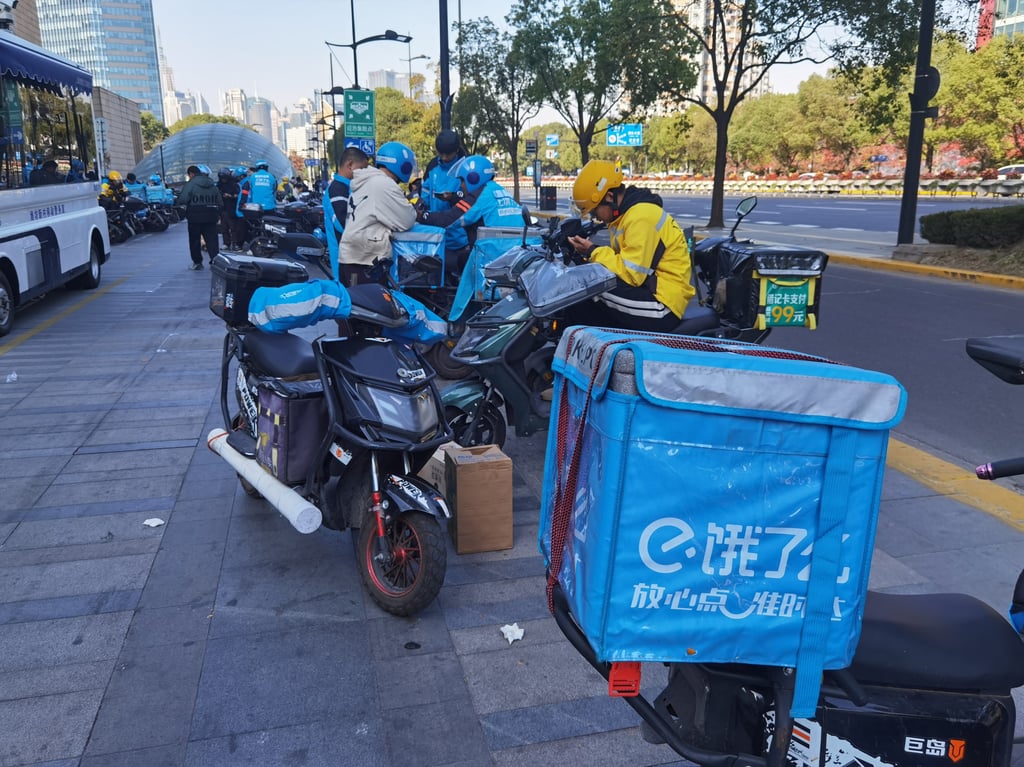 Delivery riders on the streets of Shanghai on November 29, 2023. Photo: Shutterstock