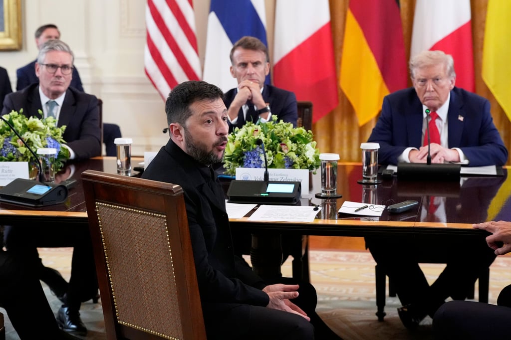 Ukraine’s President Volodymyr Zelensky speaks as British Prime Minister Keir Starmer, seated from background left, France’s President Emmanuel Macron and US President Trump listen during a meeting in the East Room of the White House on Monday. Photo: AP