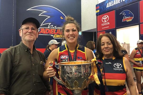 Najwa Allen with family and premiership cup.