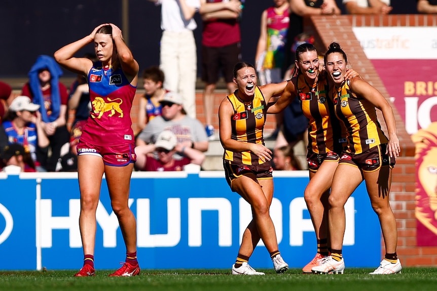 Hawthorn celebrate following the 2025 AFLW Round 01 match over Brisbane.