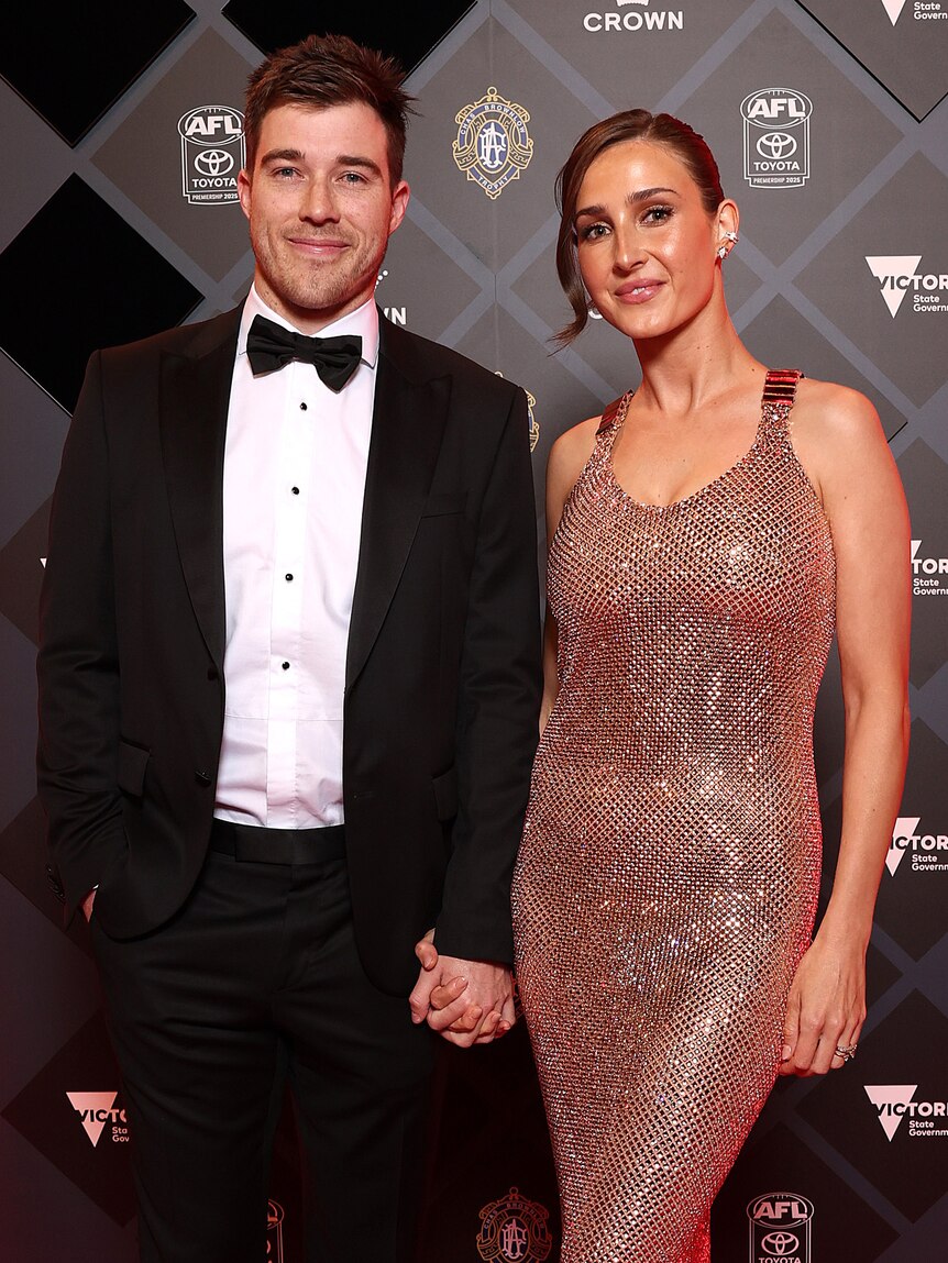  Zach Merrett of the Bombers and wife Alexandra Merrett
