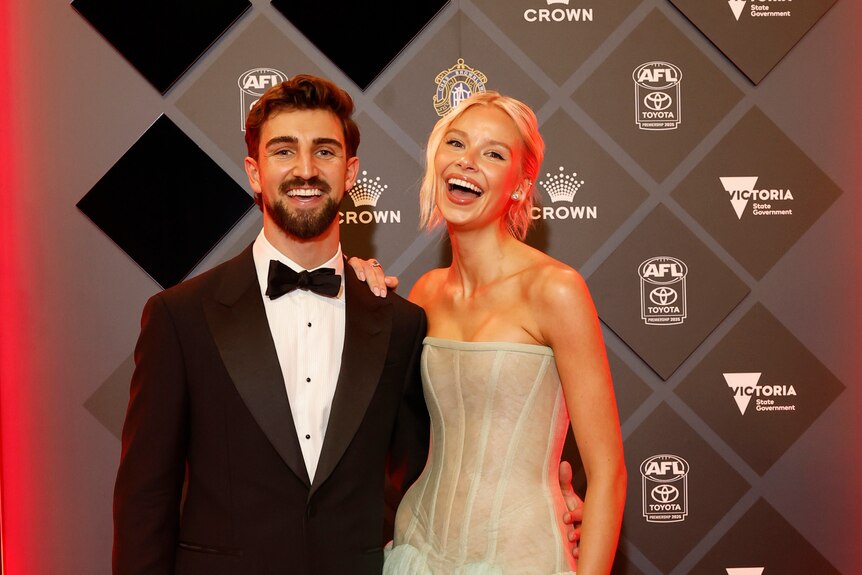 Josh Daicos of the Magpies and Annalise Dalins