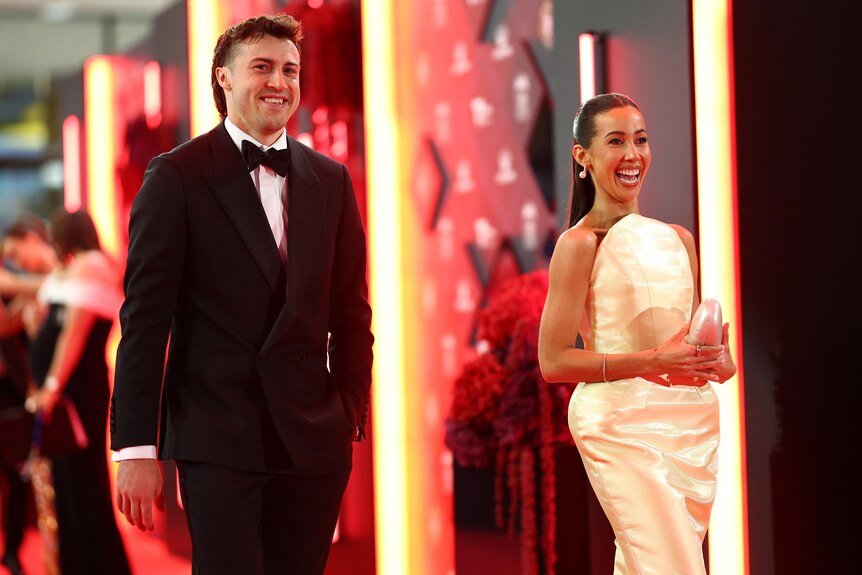 Andrew McGrath of the Bombers and Emma Laughlin 