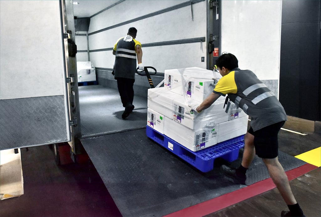A shipment is loaded onto a refrigerated truck set to head over the Hong Kong-Zhuhai-Macau Bridge. Photo: Handout A shipment is loaded onto a refrigerated truck set to head over the Hong Kong-Zhuhai-Macau Bridge. Photo: Handout