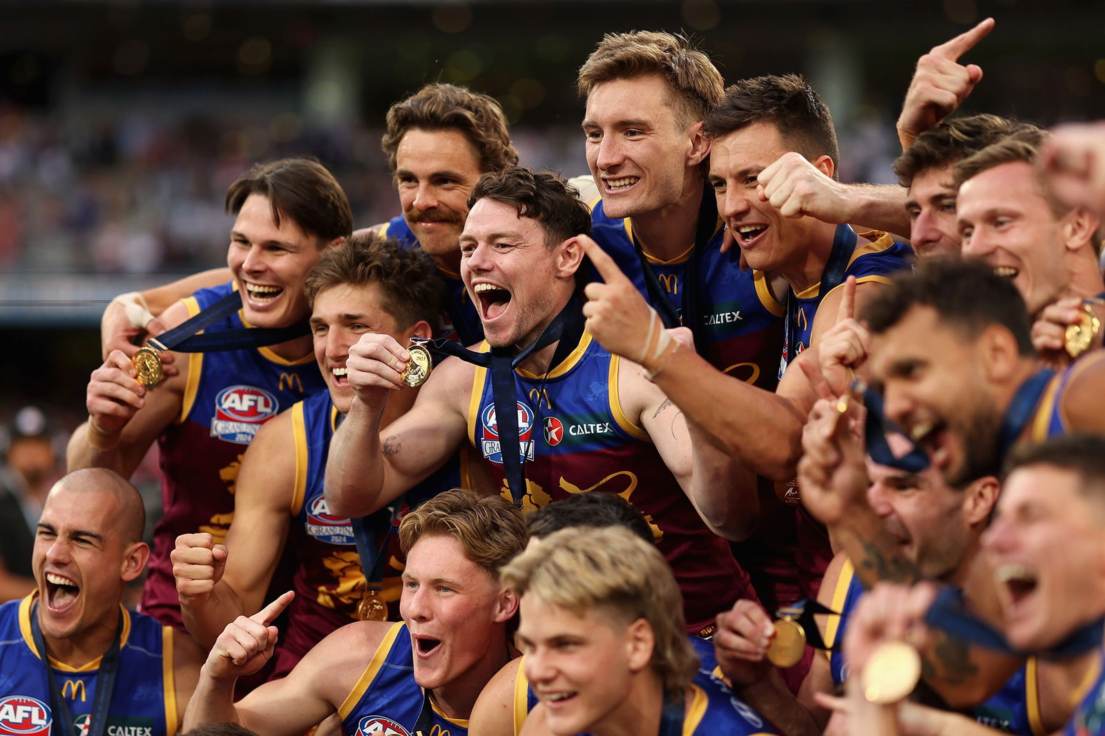 Joe Daniher (second from top left) is the only player from last year's premiership side who is no longer on Brisbane's list.