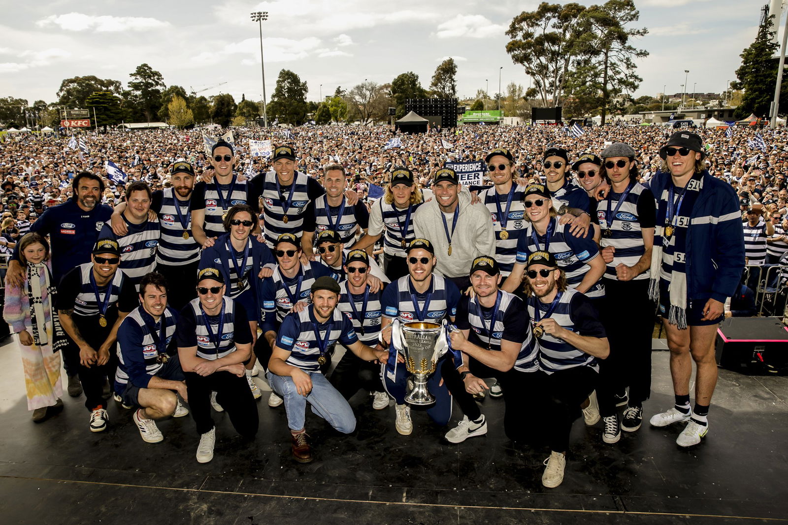 Geelong's 2022 premiership side pictured together at the fan day following their grand final win over Sydney.