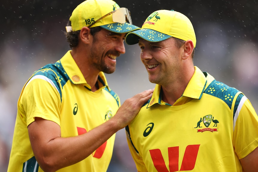 Mitchell Starc and Josh Hazlewood share a alugh during ODI against India.