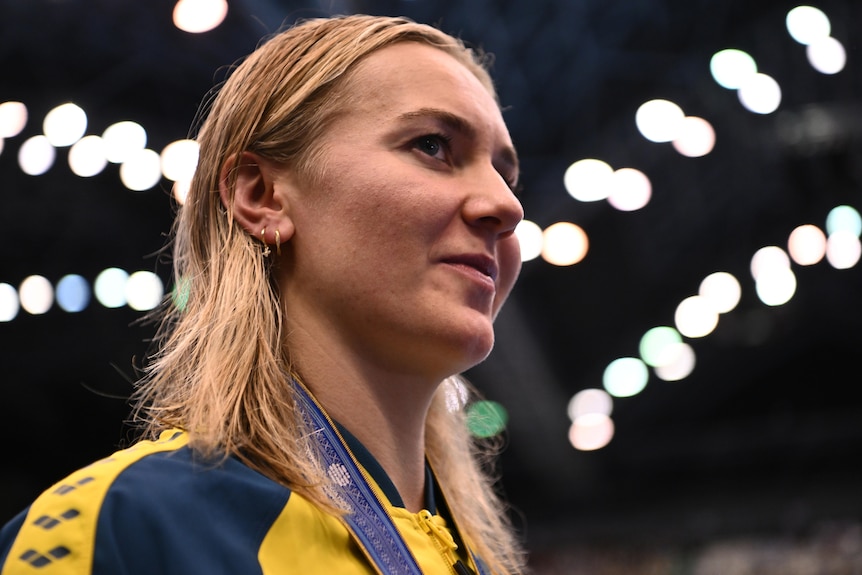 Ariarne Titmus looks to one side