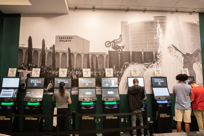 Fans place bets inside Capital One Arena's sportsbook