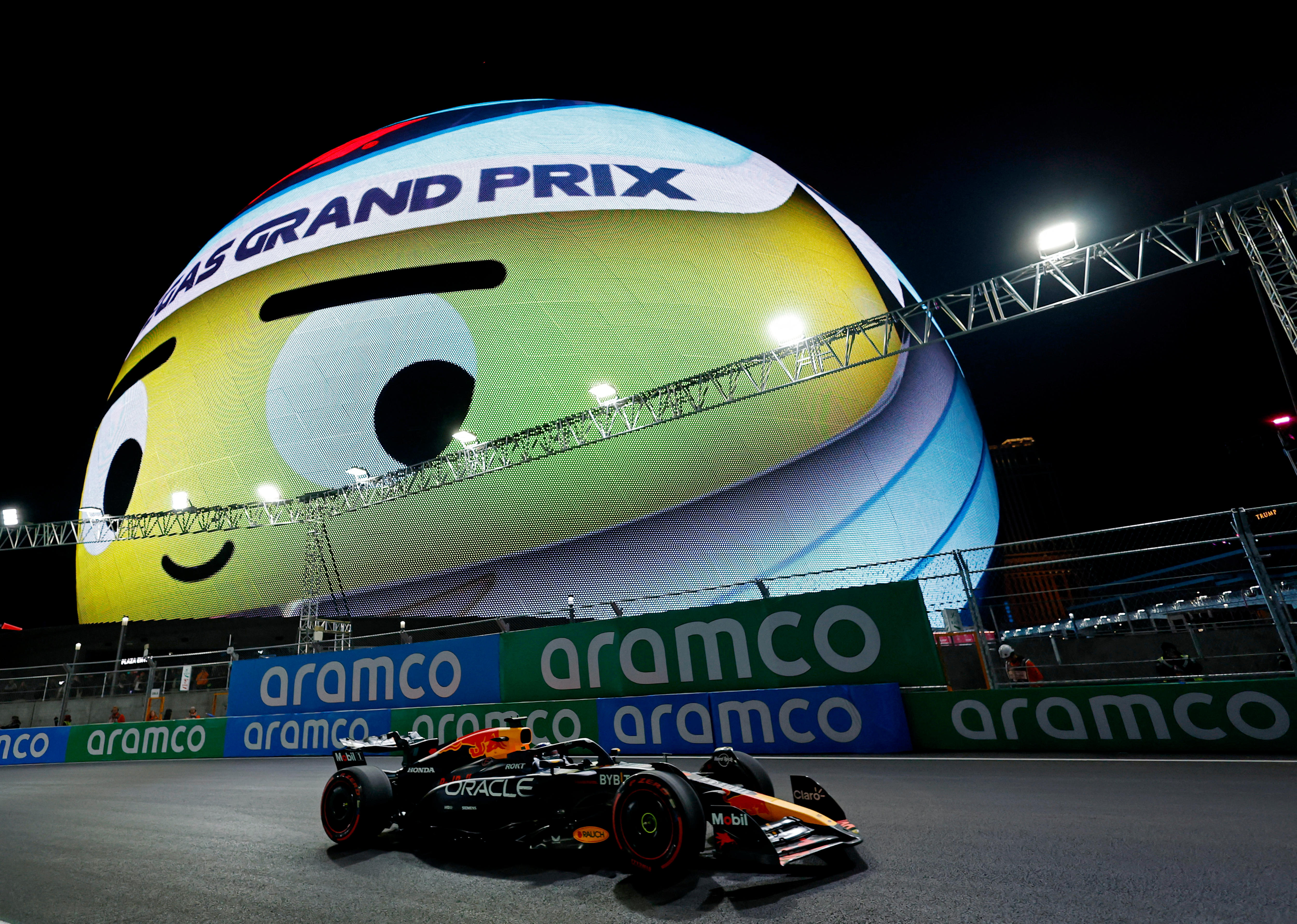Max Verstappen driving on the Las Vegas track, passed the Sphere landmark