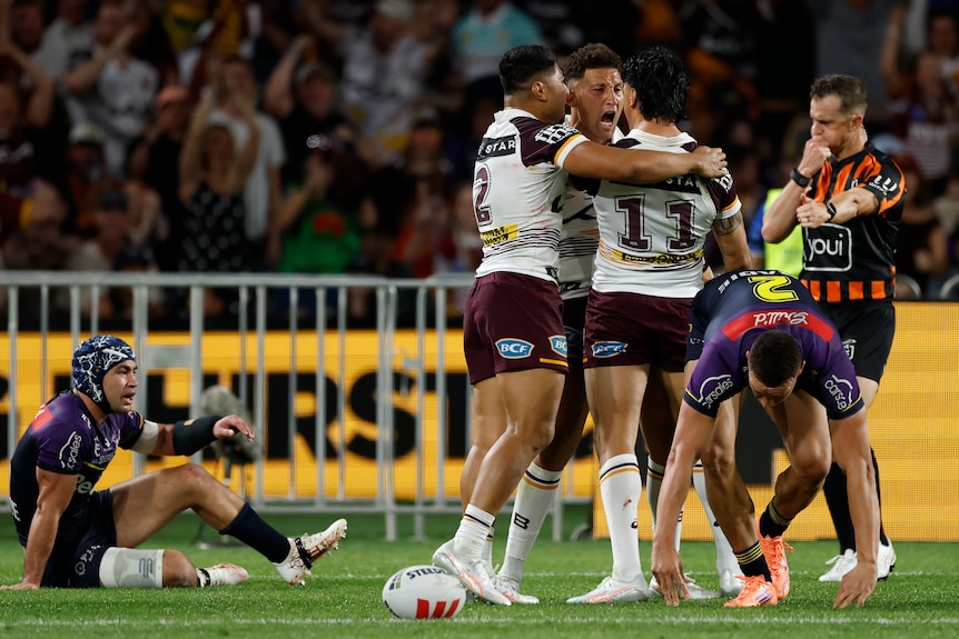 Gehamat Shibasaki celebrates one of his tries with teammates