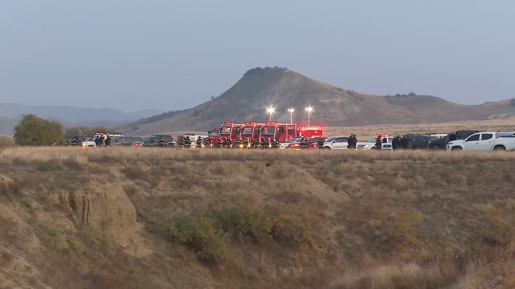 Emergency teams work at the site of the Turkish C-130 military cargo plane crash near the Azerbaijani border, in Sighnaghi municipality, Georgia, on Tuesday. Photo: TV.IMEDI via Reuters