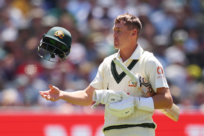 Marnus Labuschagne throws his hat in the air