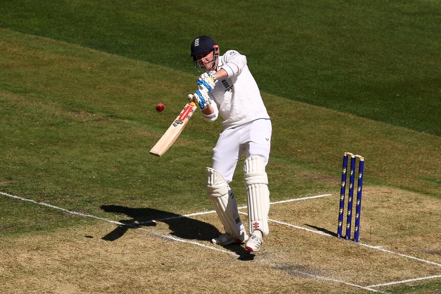 England batter Harry Brook tries to hit a ball over his shoulder during a Test match.