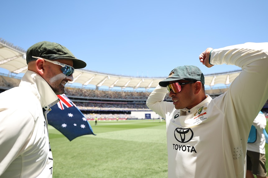Nathan Lyon shares a smile with Usman Khawaja