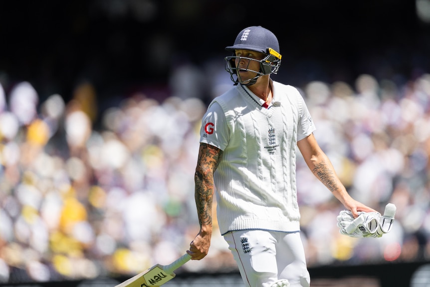 Brydon Carse walks off after his dismissal